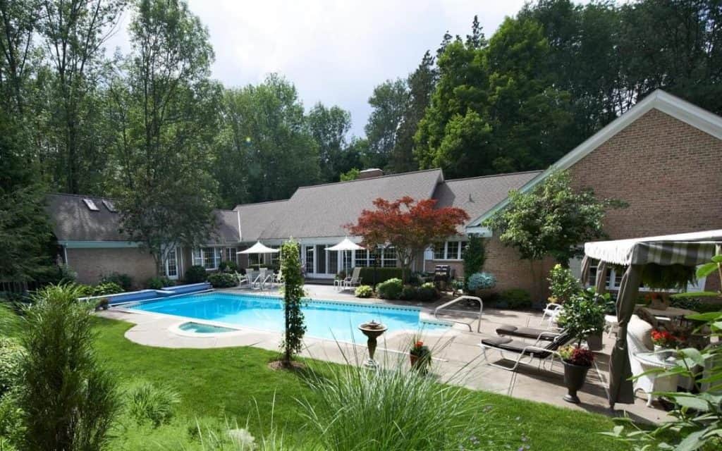 House with pool in backyard