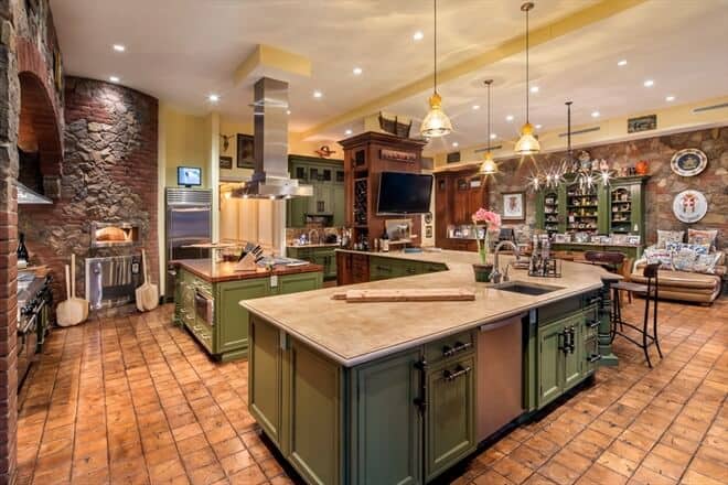 Mediterranean style kitchen with island with variety and hood green cabinets spanish kitchen style zillow