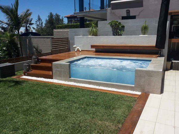 Contemporary Glass Wall Pool With Above Ground Design