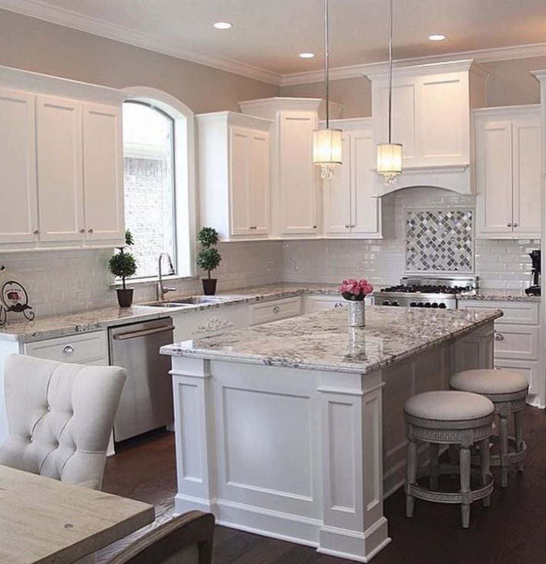 White Kitchen Island With Granite Countertop