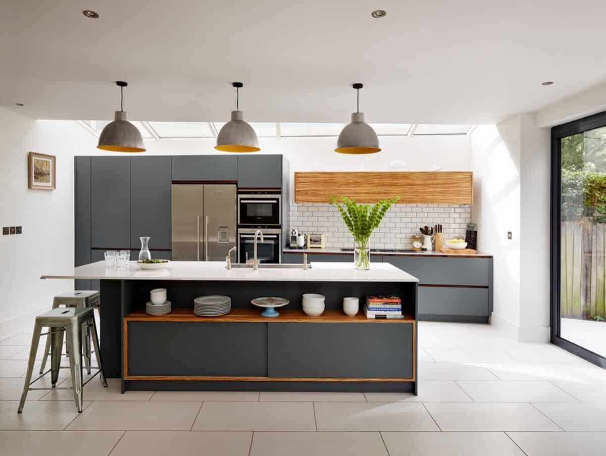 beige kitchen cabinet with grey wall