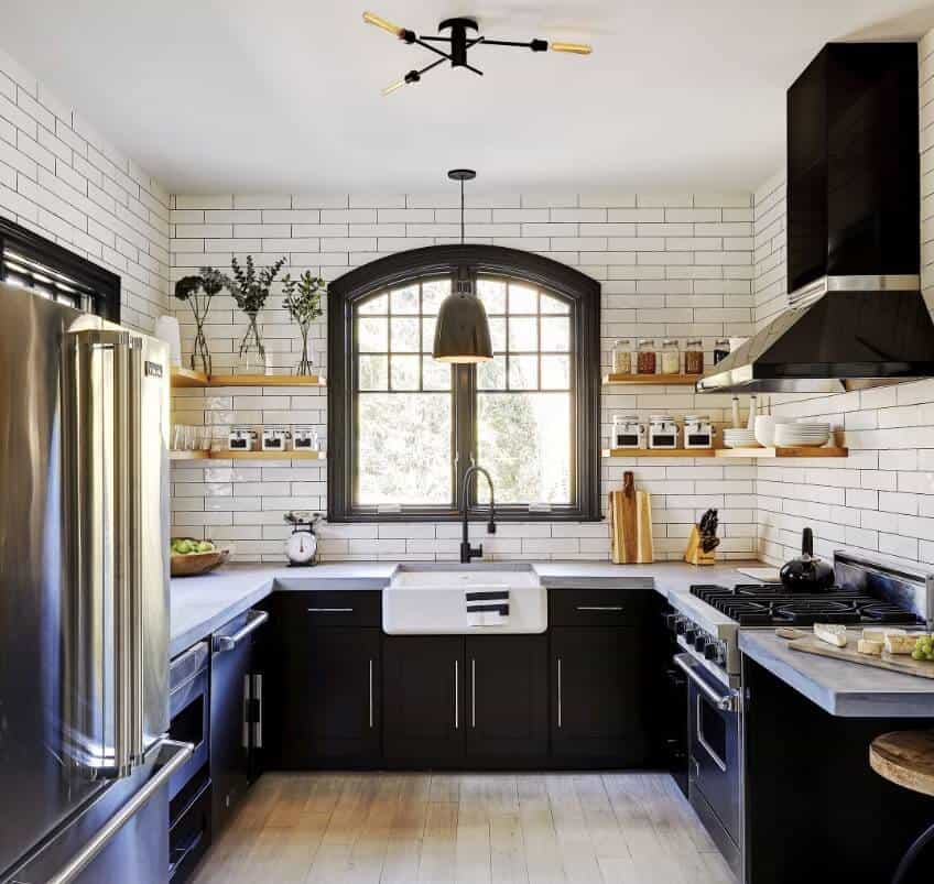 black kitchen cabinet with white countertops