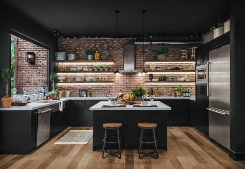 black kitchen cabinet with brown wall