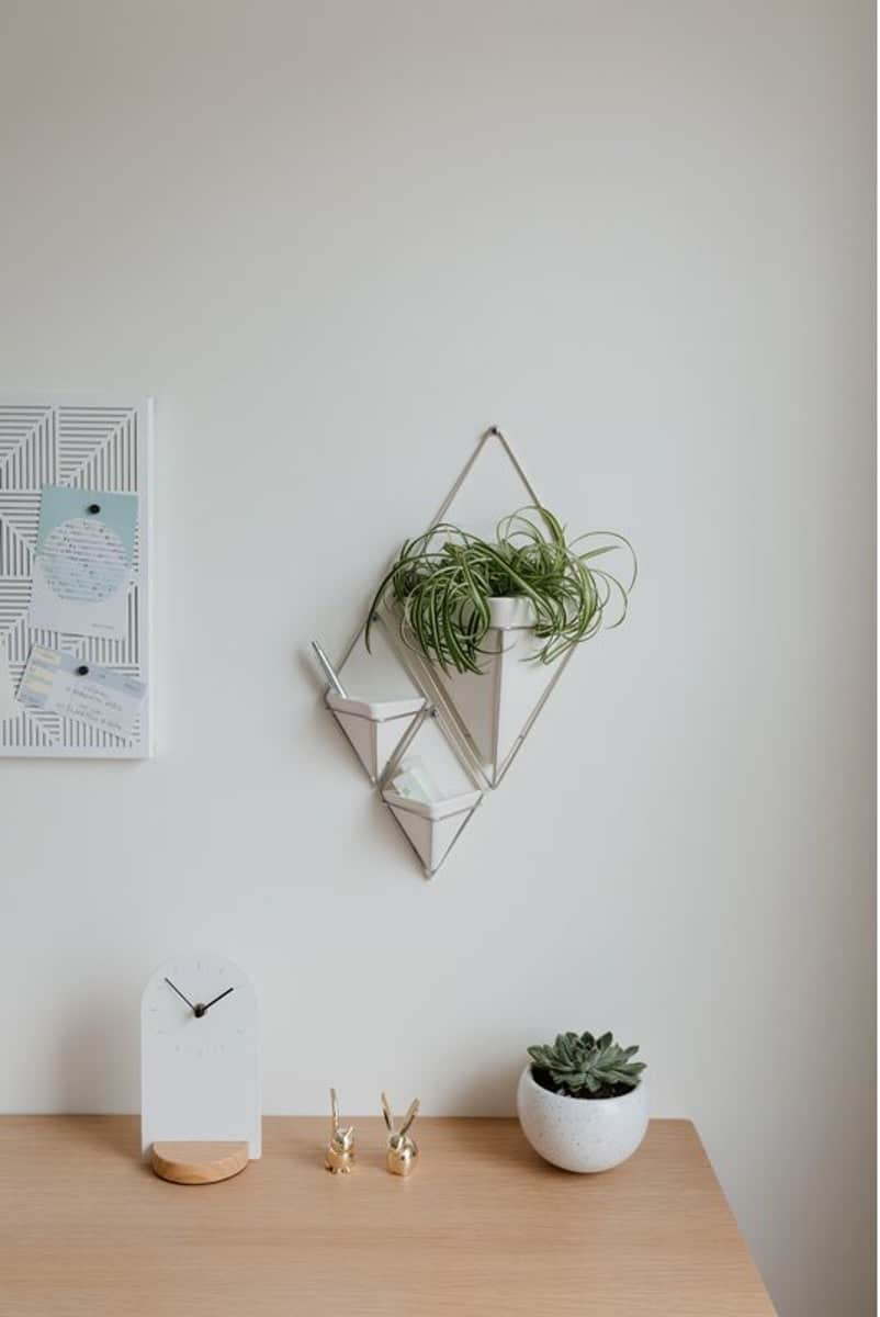 Install A Set Of Pyramidal Wall Hangings