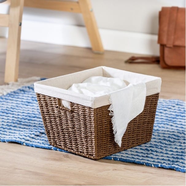 Toss Your Dirty Clothes Into A Wicker Laundry Basket