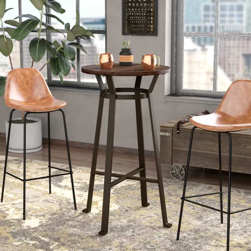 Add a Rustic Touch With an Iron and Wood Table