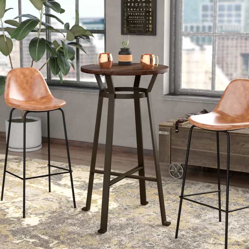 Add A Rustic Touch With An Iron And Wood Table