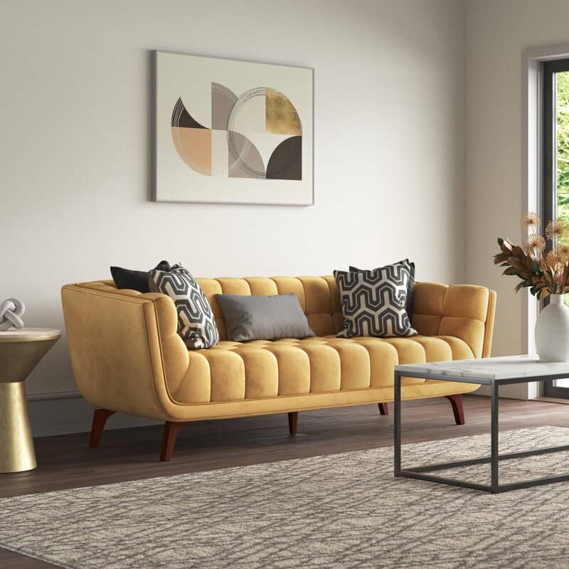 Yellow Furniture Creates A Daring Contrast Against Dark Wood Floors