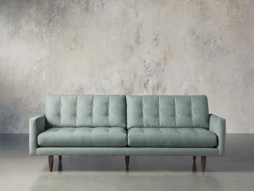 Add A Teal Couch For A Unique Touch