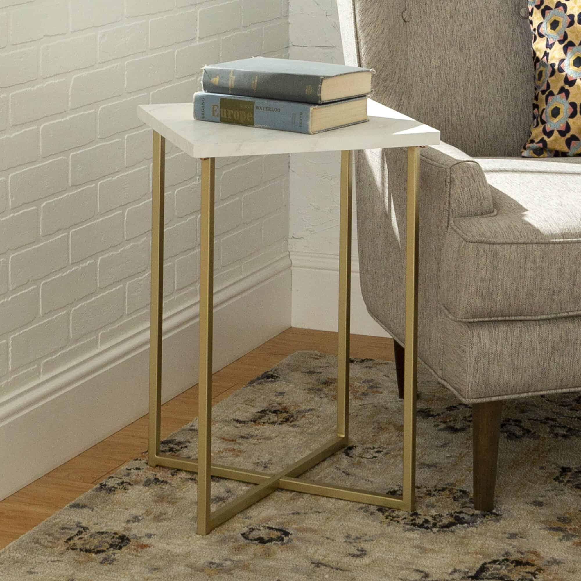 This White And Gold End Table Adds A Stylish But Minimal Touch To A Home