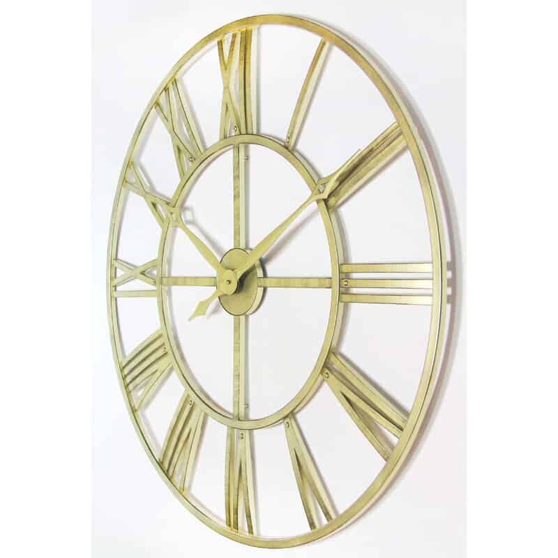 An Oversized Golden Clock Is A Practical But Sophisticated Piece Of Decor