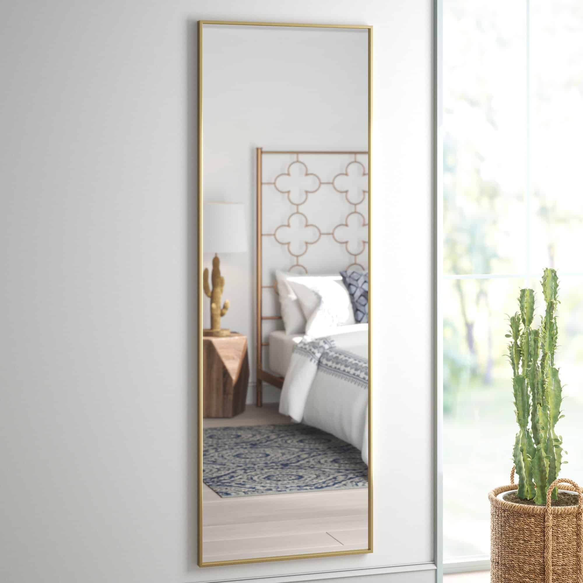 Gold-Rimmed Mirrors Are A Staple Of Lux Decor