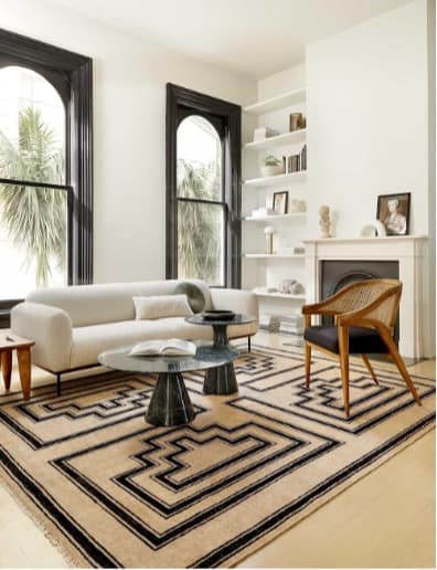 Cover Awkward Empty Floorspace With A Large Rug