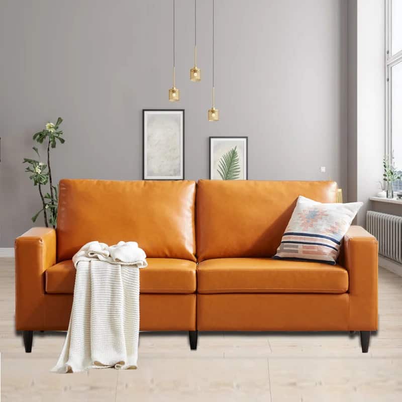Add Some Contrast With An Orange Couch