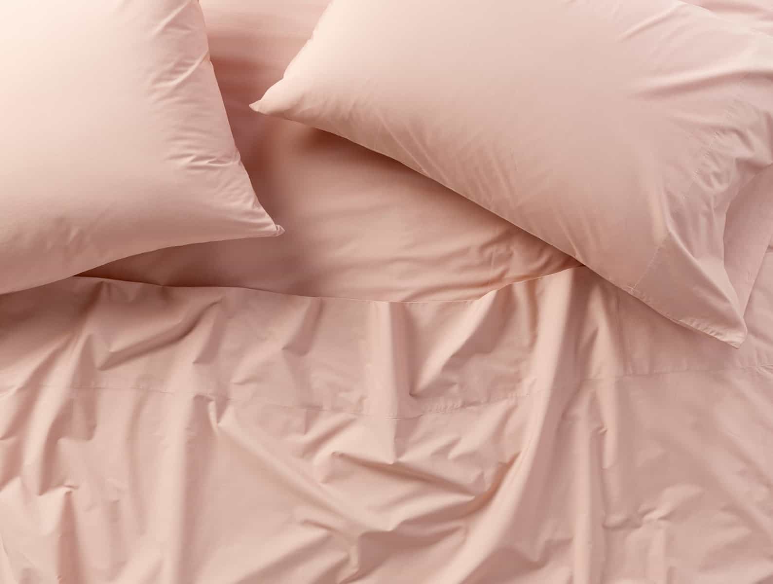 Rose Sheets Are A Harmonious Pick For A Gray Comforter