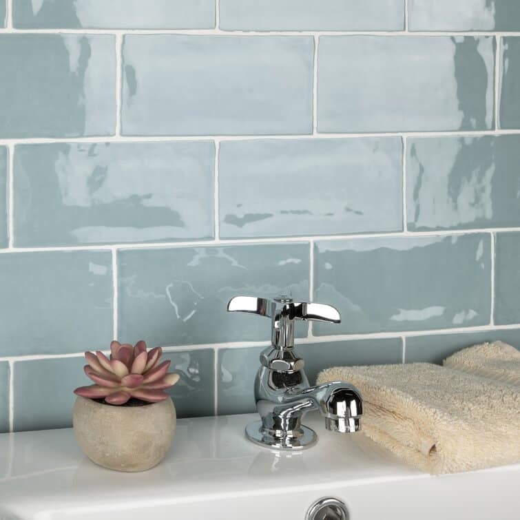A Washed Out Sky Blue Backsplash Suits The Coastal Look Perfectly