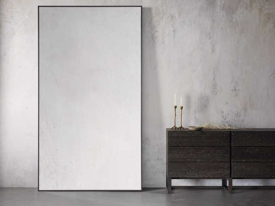 An Oversized Mirror Looks Beautiful On A Tall Wall