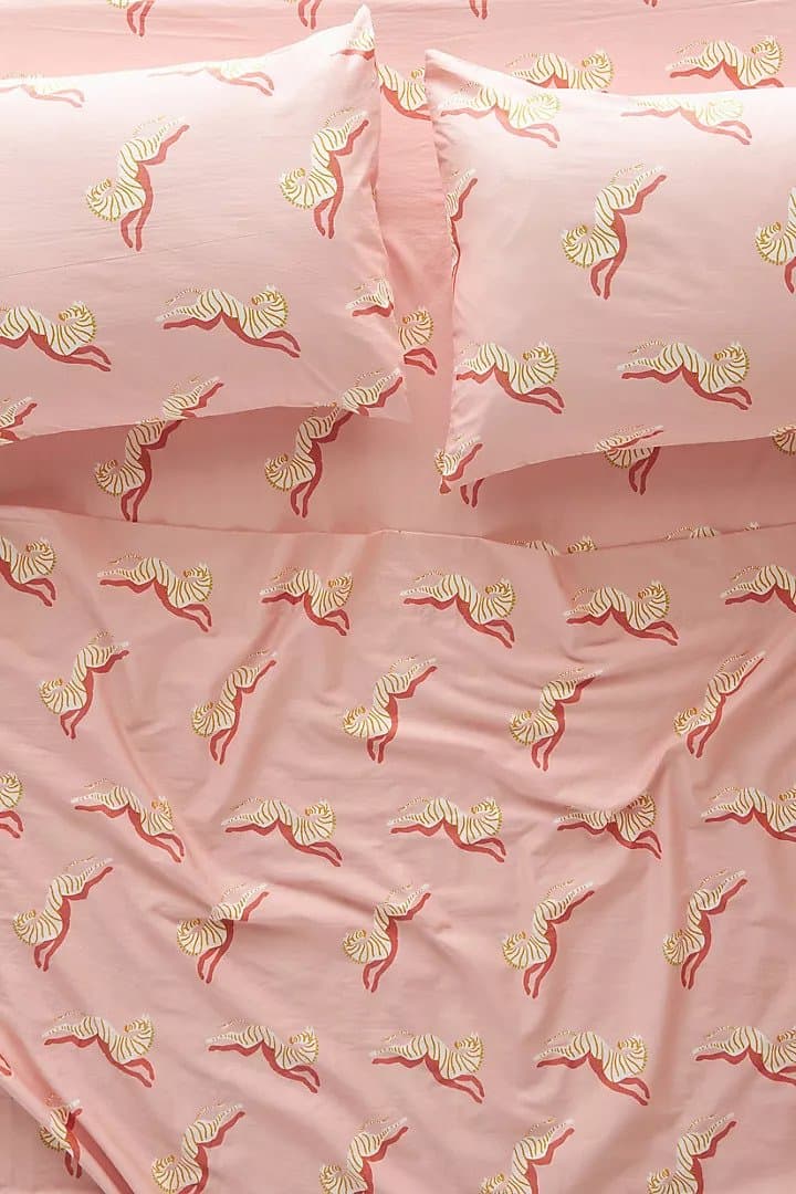 Add A Pop Of Color To Your Room With Pink Printed Sheets