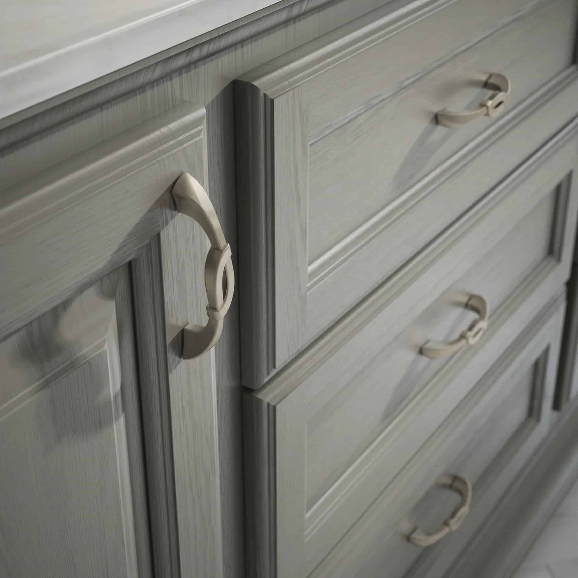 A Sophisticated Nickel Pull Adds A Dash Of Luxury To Your Light Gray Cabinets