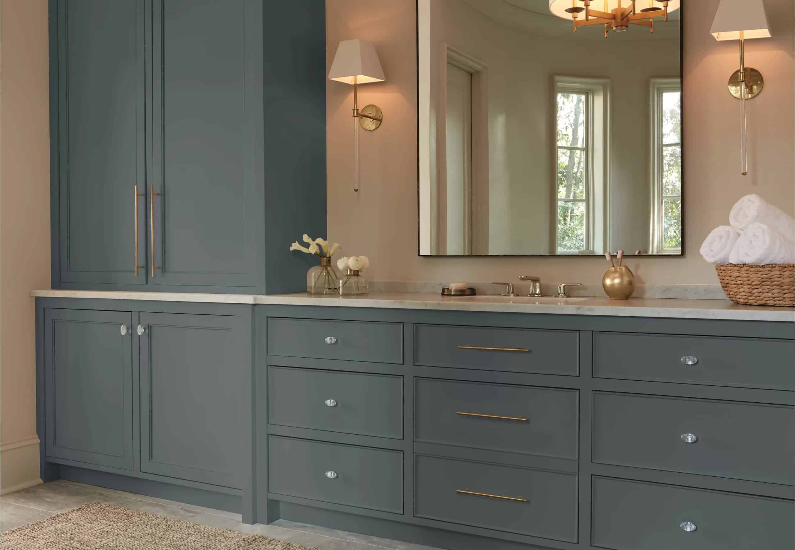 Brassy Hardware Goes Well With Bluish Gray Cabinets